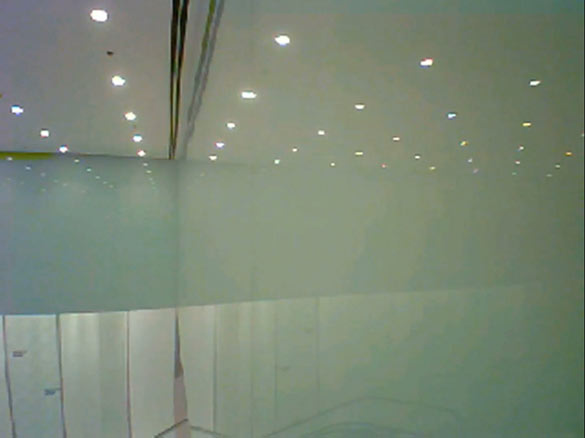 Tobias Madison & Emanuel Rossetti, MELT, 2012. Vidéo sous-titrée 11’ en boucle / Digital Video, Subtitle File, 11’ looped. Vue d’installation / Installation View : Art Hong Kong, Art Futures 2012. Courtesy Tobias Madison & Emanuel Rossetti